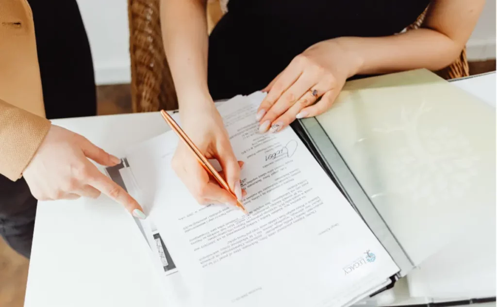 Travel concierge assisting with transportation and logistics for a treatment journey