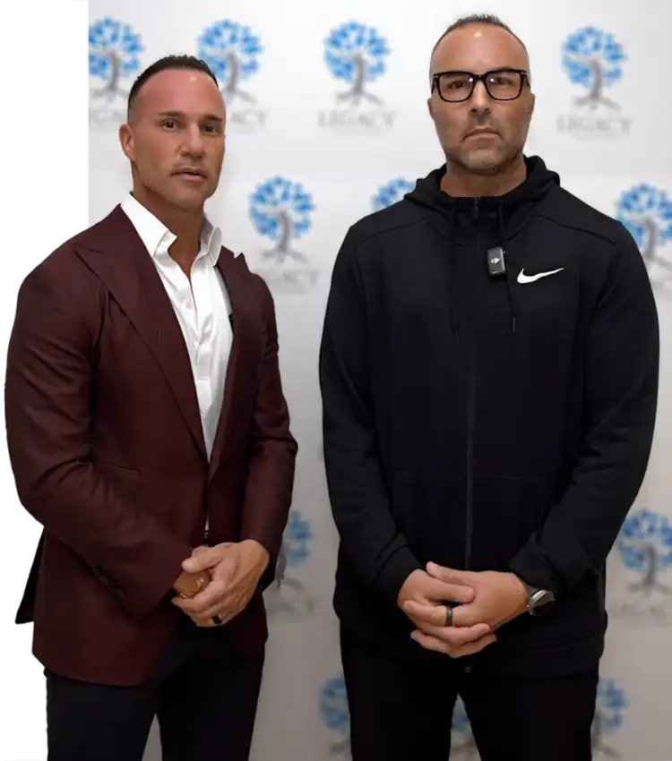 Ben Fox and Marc Effron, founders of Legacy Healing Center, standing together at a Legacy Healing Center event.